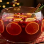 festive non alcoholic christmas punch in a glass bowl