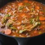 Ground Beef Cabbage Soup Recipe 7 pot of homemade cabbage soup simmering on stove
