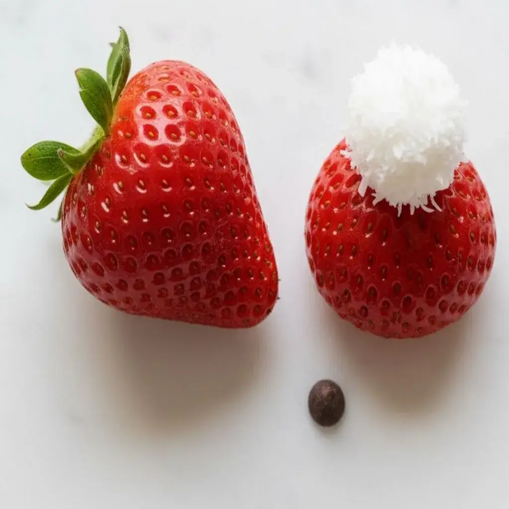 Cheesecake Strawberry Santas: The Easiest, Most Adorable Holiday Treat 9 how to cut strawberries for santa dessert